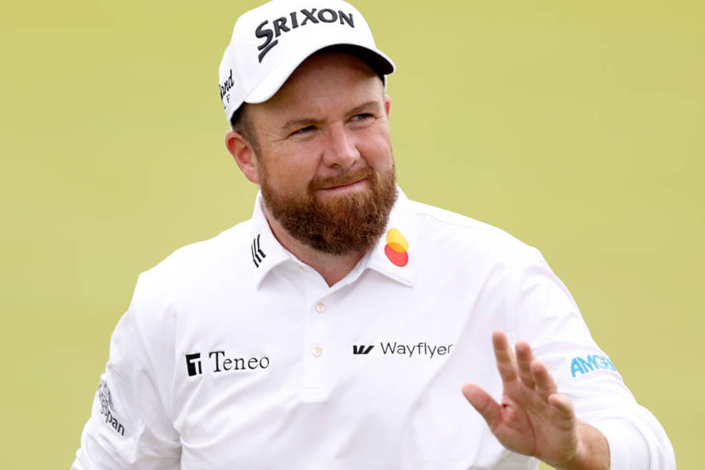 Shane Lowry waves to the crowd during his second round at The 152nd Open, at Royal Troon